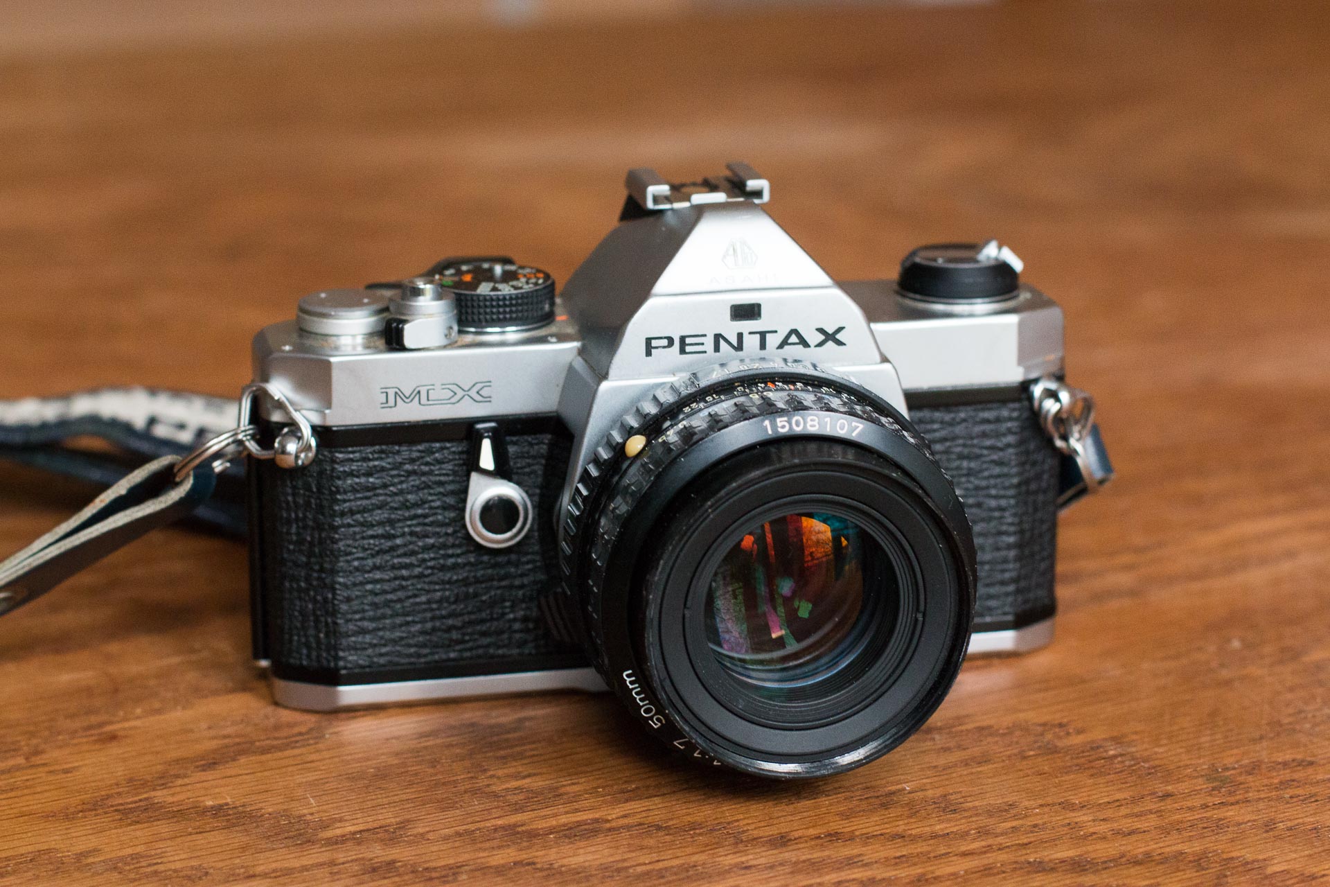 Excellent appareil photo reflex 35 mm Pentax KM avec objectif 50 mm f/1,4  du Jap
